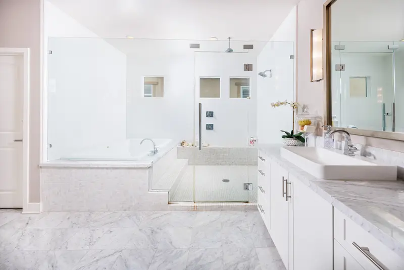 Primary bathroom with soaking tub and glass shower — Aliso Viejo real estate photography