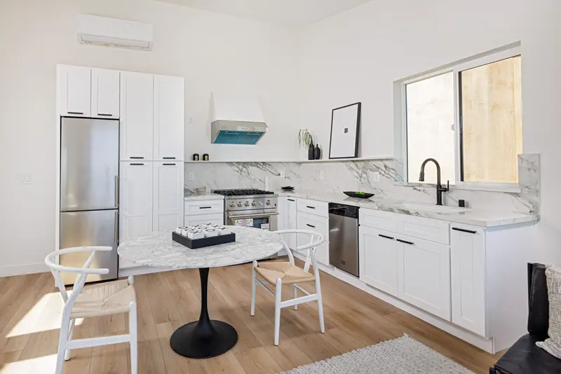 Casita kitchen with round dining table — Laguna Beach real estate photography