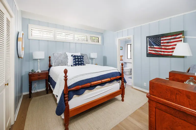 Guest bedroom with American flag art — Laguna Beach real estate photography