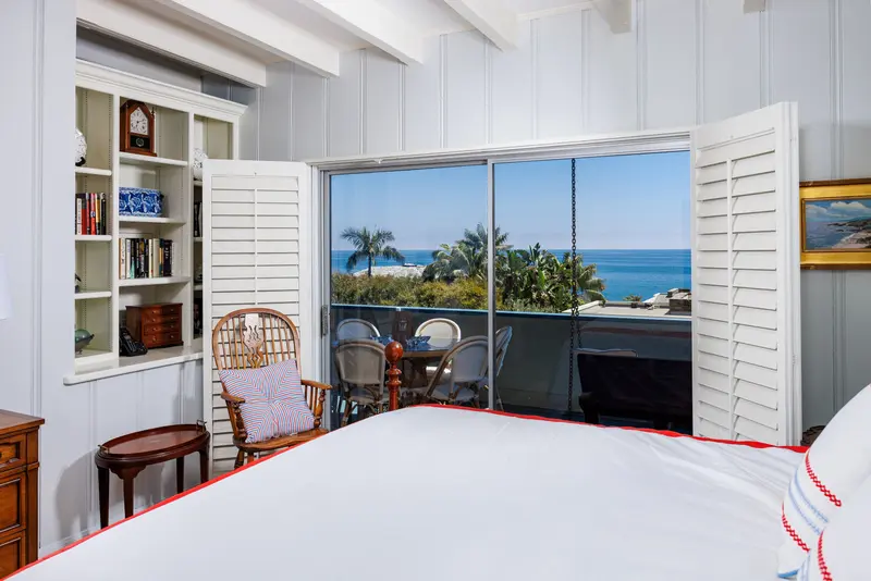 Primary bedroom deck opening to an ocean view — Laguna Beach real estate photography