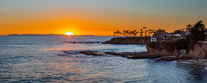 Aerial sunset view of the coastline with Catalina Island in the distance, Shaw's Cove, North Laguna Beach