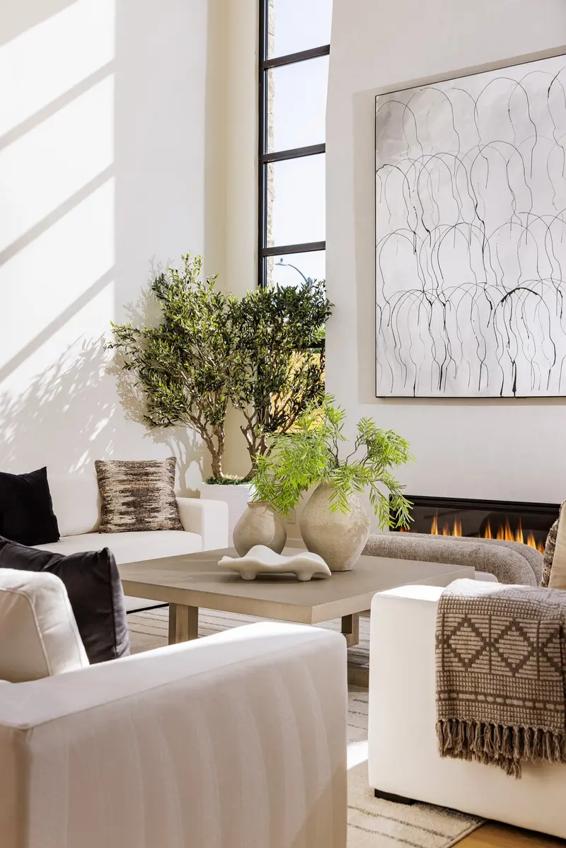 Living room with fireplace and floor-to-ceiling windows, natural light, Dover Shores, Newport Beach