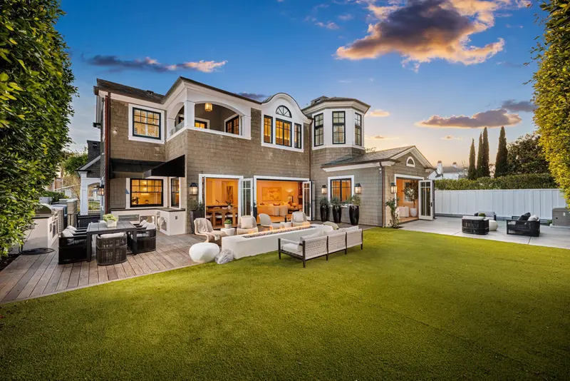 Backyard entertaining area at twilight — Newport Beach real estate photography