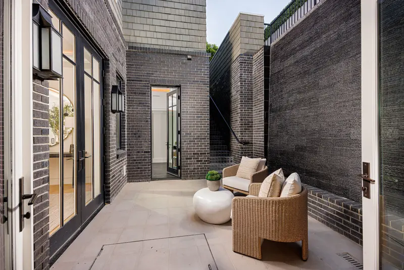 Dark brick side courtyard with stairway — Newport Beach real estate photography