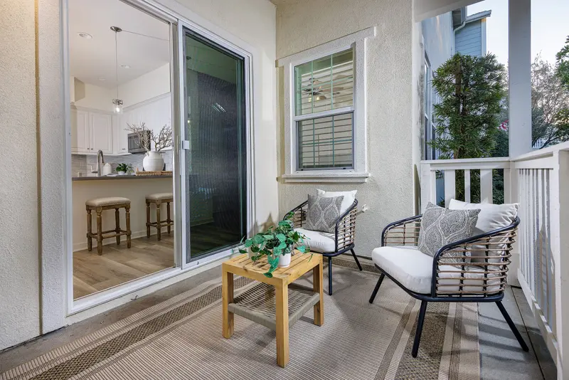 Balcony seating off the kitchen at dusk — Rancho Mission Viejo real estate photography
