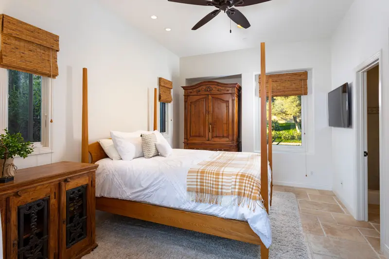 Guest bedroom with antique armoire — San Clemente real estate photography
