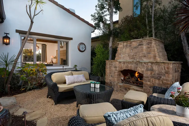 Outdoor stone fireplace lounge — San Clemente real estate photography