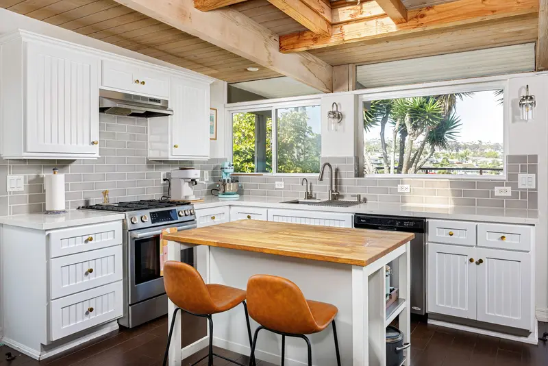Kitchen island with wood beam ceiling — San Clemente real estate photography
