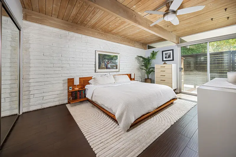 Primary bedroom with exposed wood ceiling — San Clemente real estate photography