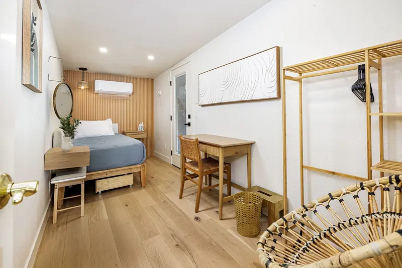 Guest bedroom with wood slat wall — Laguna Beach real estate photography