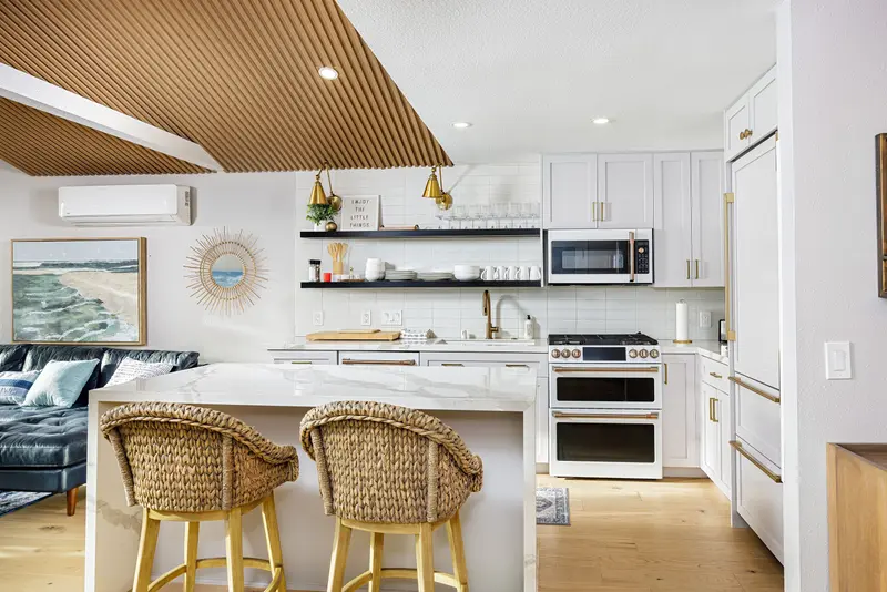 Kitchen with fluted wood range hood — Laguna Beach real estate photography
